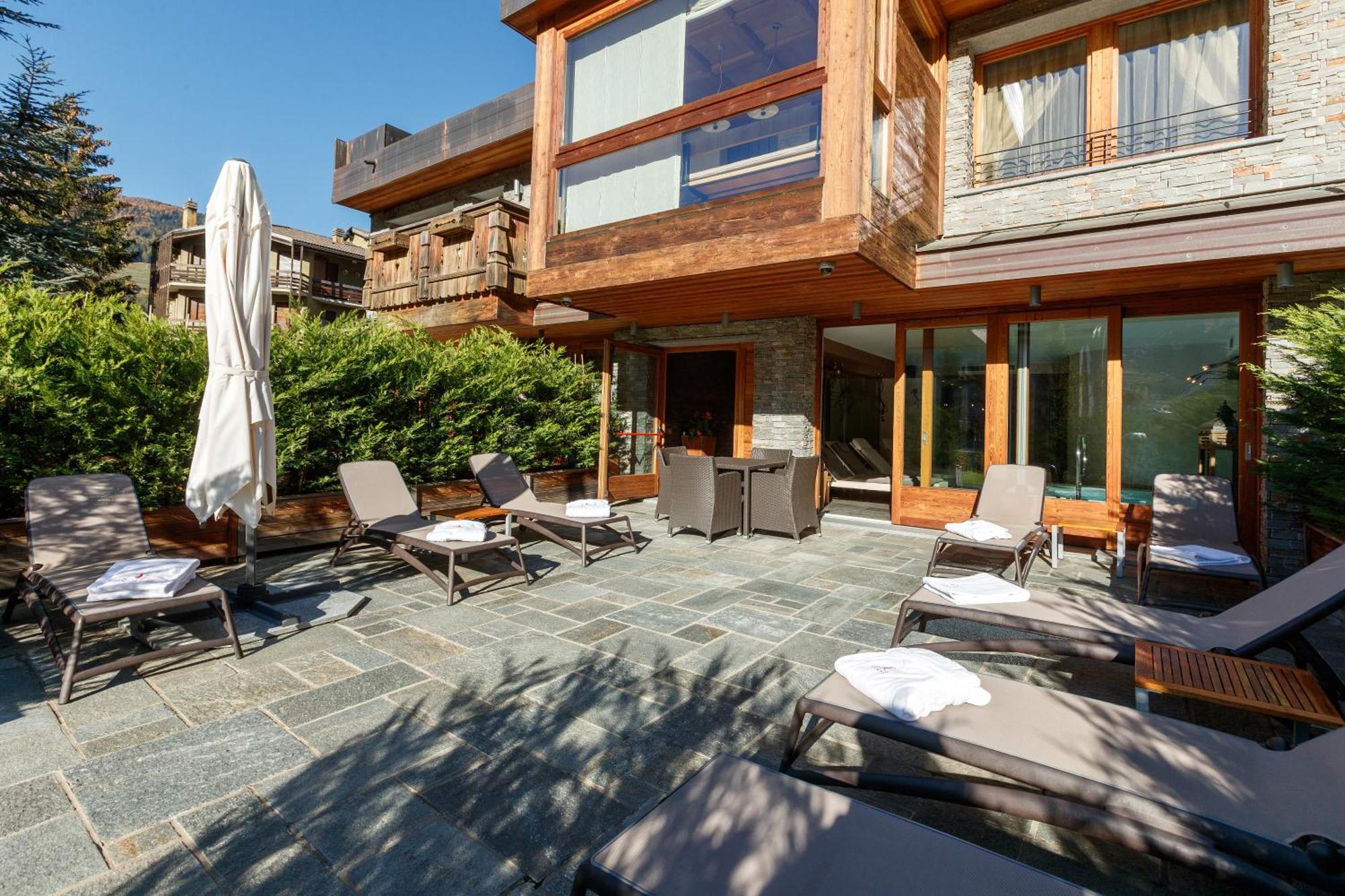 Hotel Sottovento Luxury Hospitality à Bormio Extérieur photo